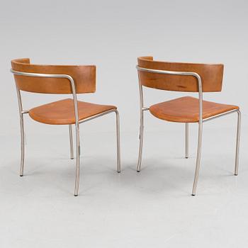 A pair of Erik Karlström leather upholstry chairs, circa 1965.