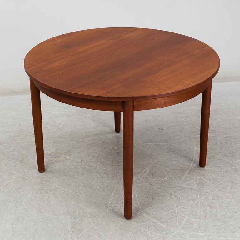 a teak dining table from the second half of the 20th century.