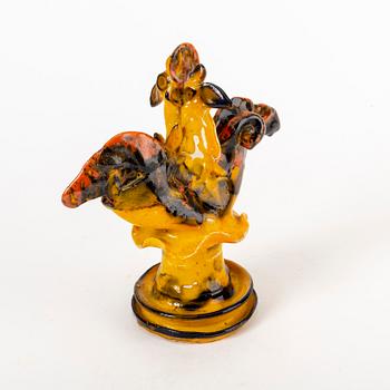 A signed Ulrica Hydman-Vallien stoneware figurine.