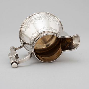 A Russian 19th century parcel-gilt silver tea pot and cream jug, mark possbly of Alexander Lokin, St. Petersburg 1893.
