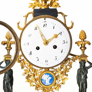 A late Gustavian marble and ormolu portico mantel clock, late 18th century.
