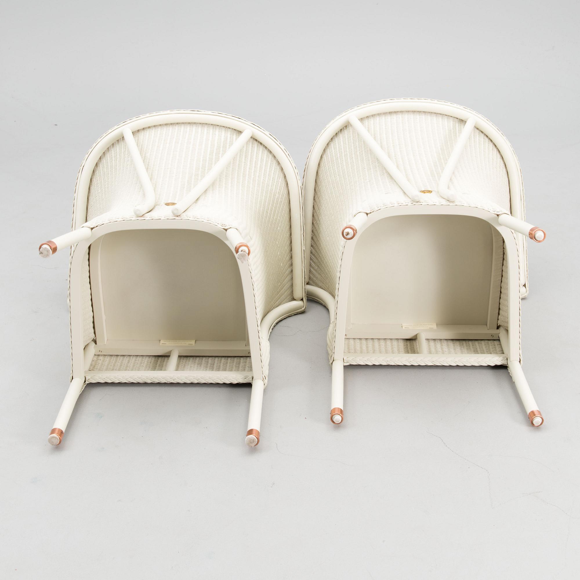 A PAIR OF ARM CHAIRS, Lloyd Loom, Spalding, England,  21st century.
