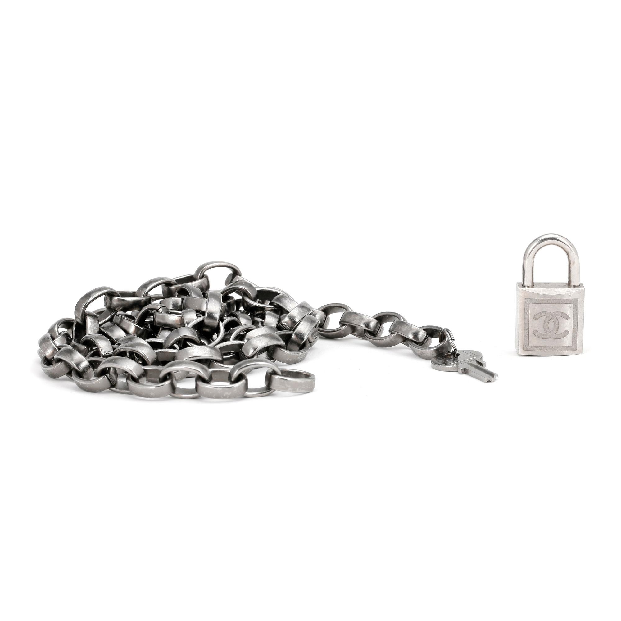 CHANEL, a chain belt.