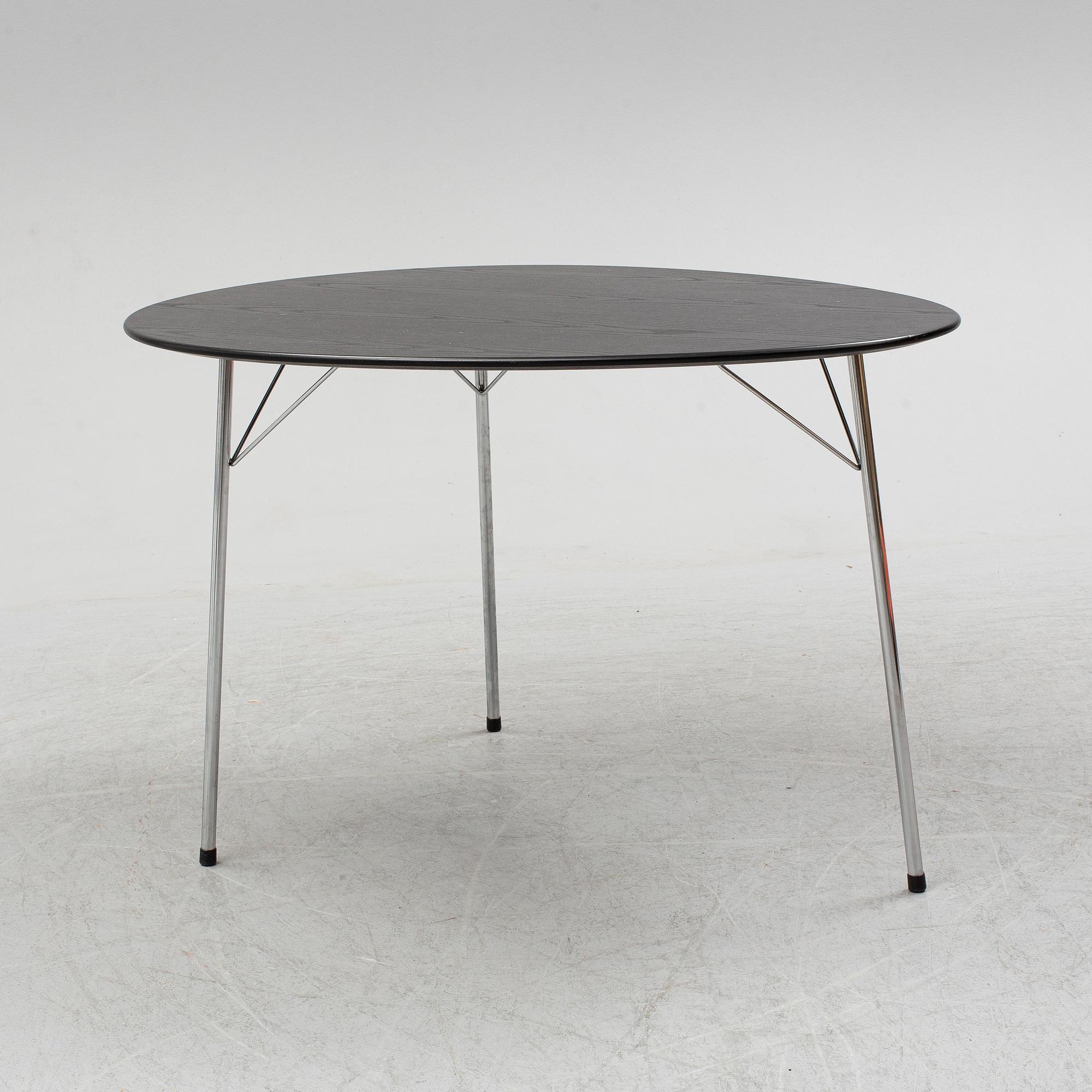 An Arne Jacobsen "Centenary Package" comprising three "Ant Chairs" and an eggshaped table, Fritz Hansen, Denmark.