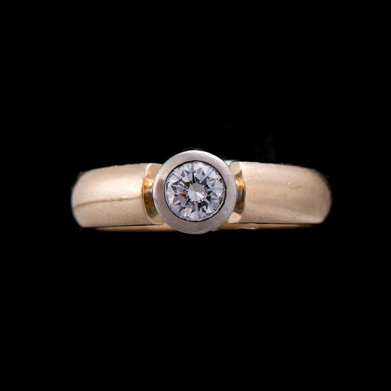 RING, 18K guld, briljantslipad diamant. Vikt ca 5,7 g.