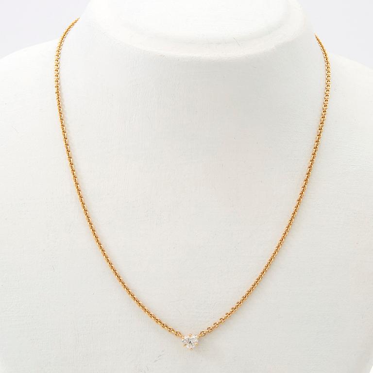 Necklace, 18K gold with heart-shaped diamond.