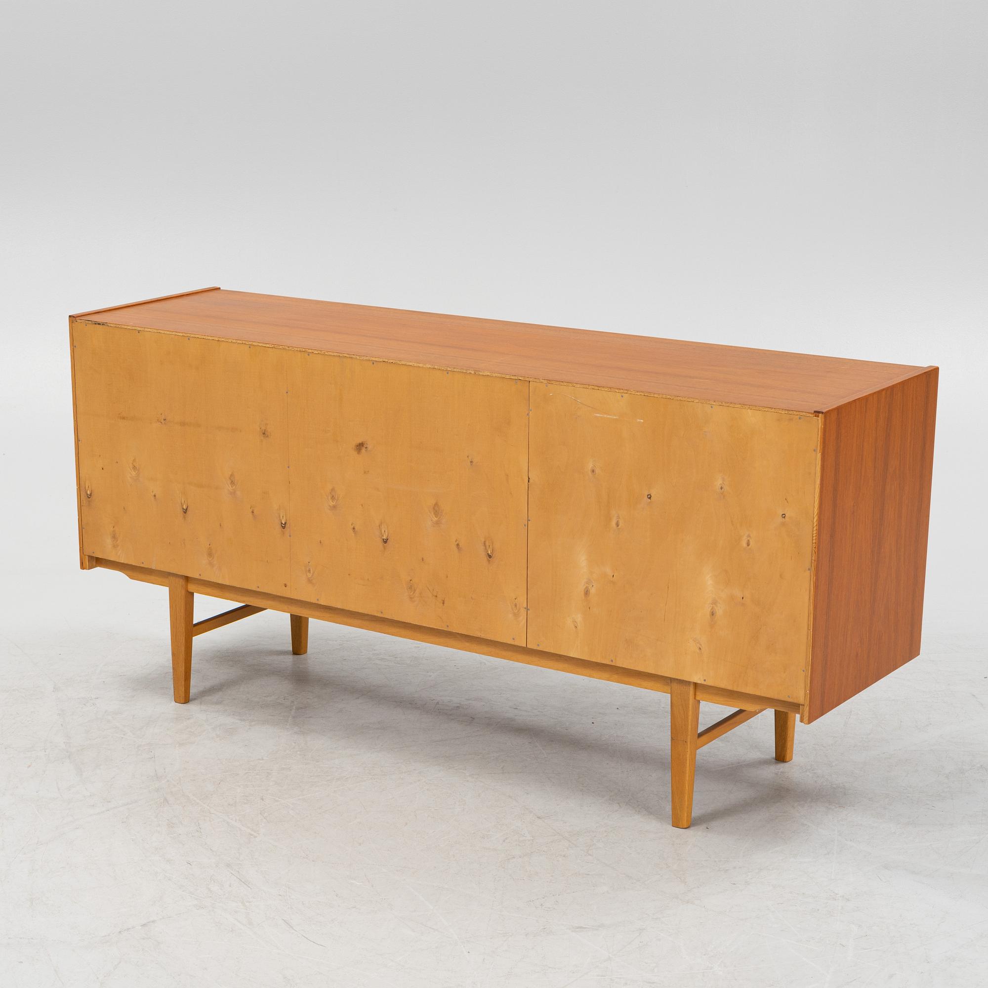 A 1950's/60's teak veneered sideboard.