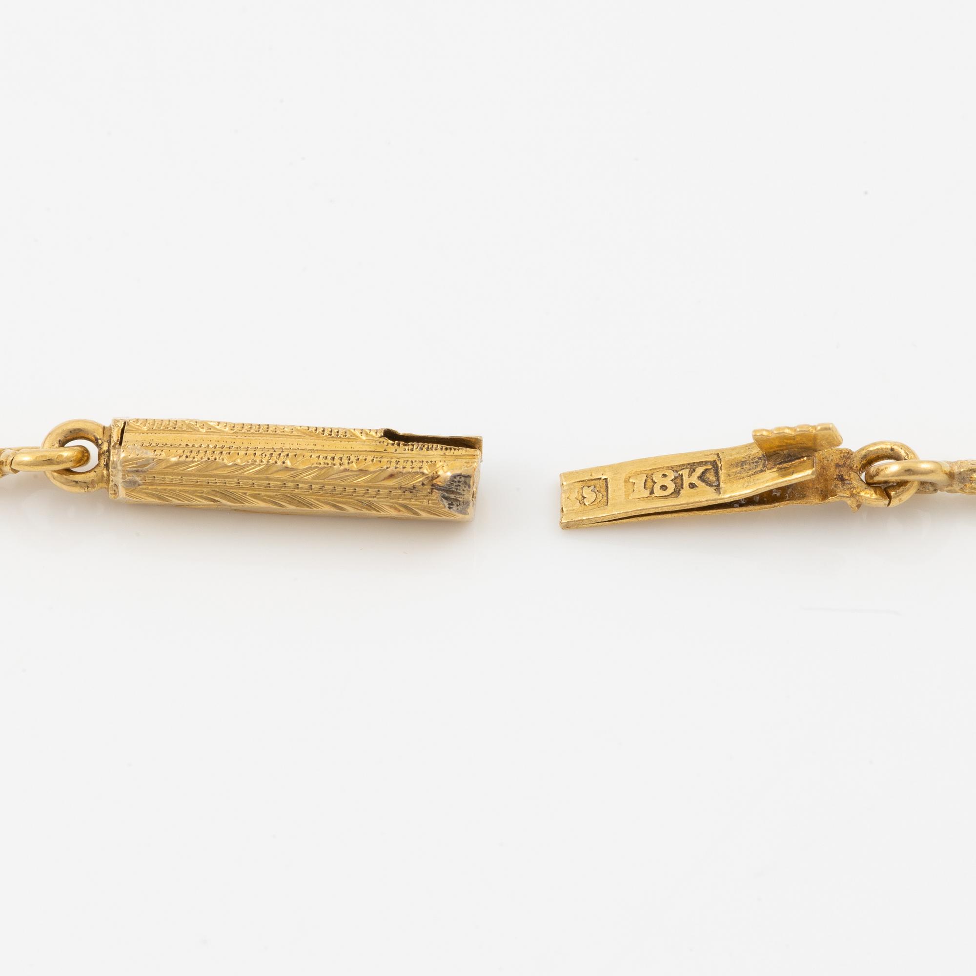 Pendant, cross, 18K gold and old-cut diamonds, together with a matching chain in 18K gold.