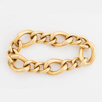 An 18K gold Tännler bracelet.