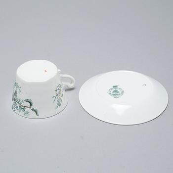 A earthenware table set of 136 pcs "Vexiö Guld",  by Arvid Ekberg, Gustafsberg, from around year 1900.