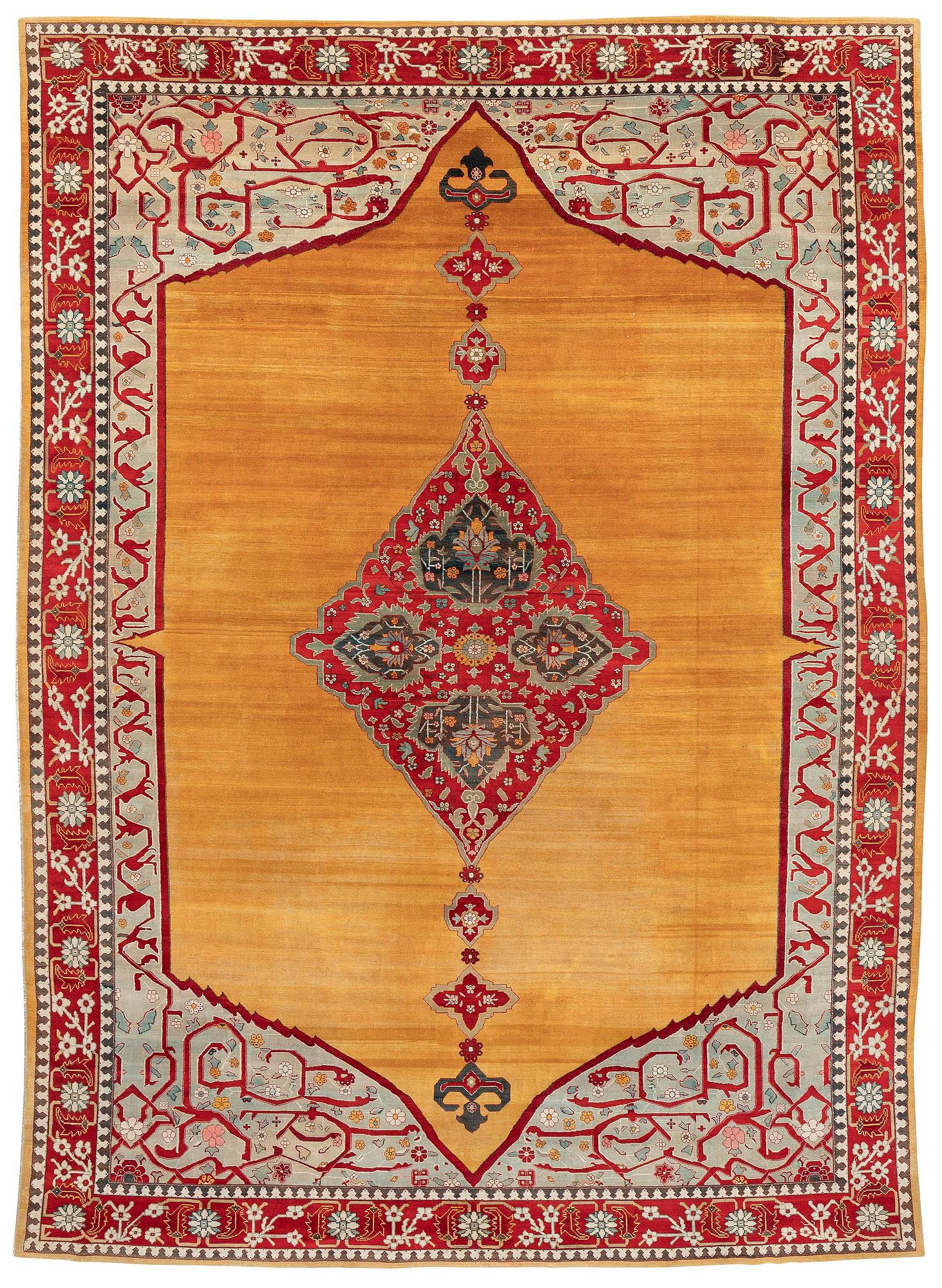 An antique Agra carpet, northern India, c. 389 x 289 cm.