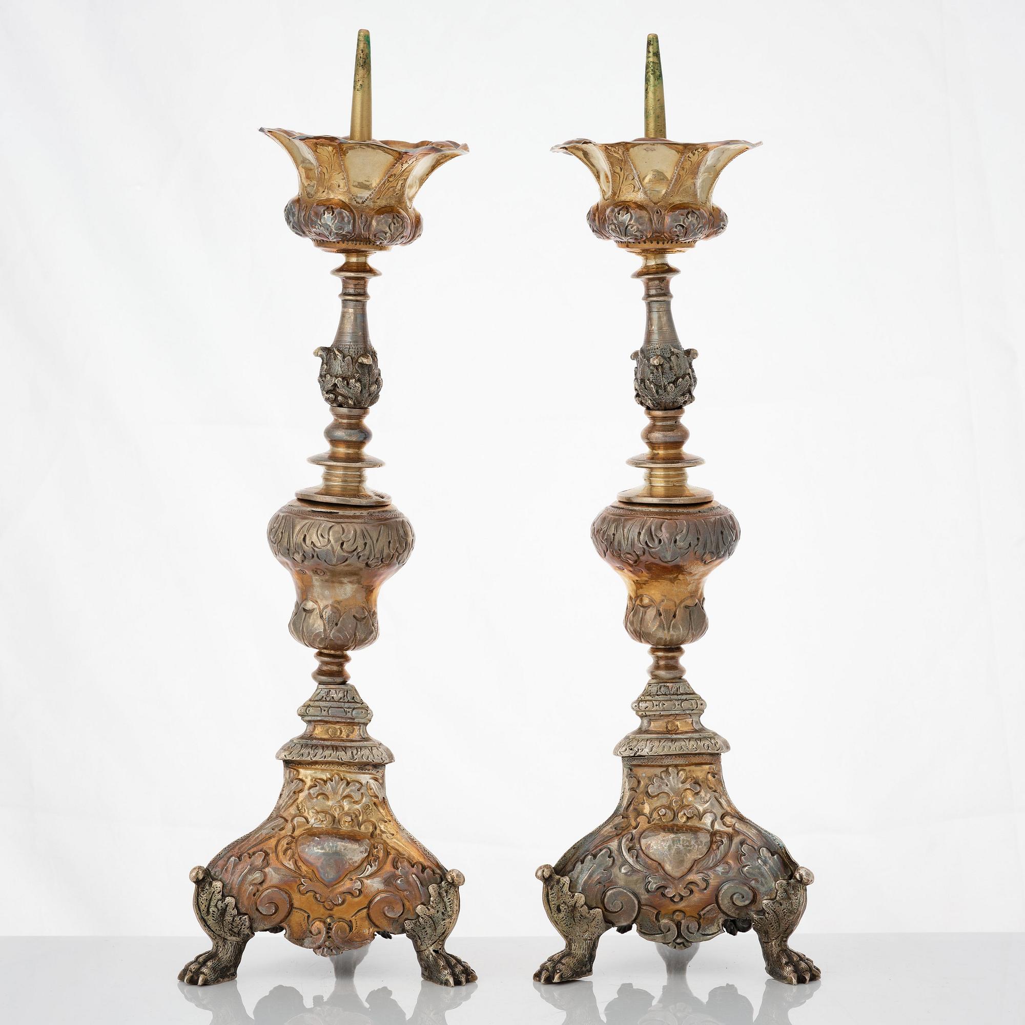 Four Italian 17th/18th century silver-gilt candlesticks, unidentfied makers mark ZP, Venice.