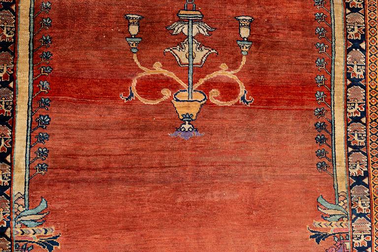 A rug, antique, silk Heriz, ca 166,5-170 cm x 116-120 cm.