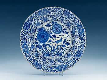 1684. A blue and white dish, Qing dynasty, Kangxi (1662-1722).