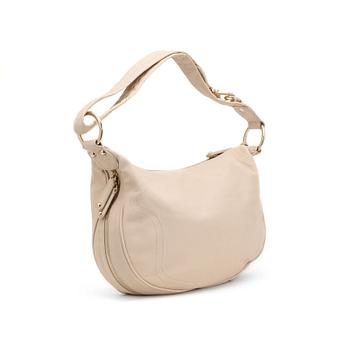 TOD'S. a light beige leather handbag.