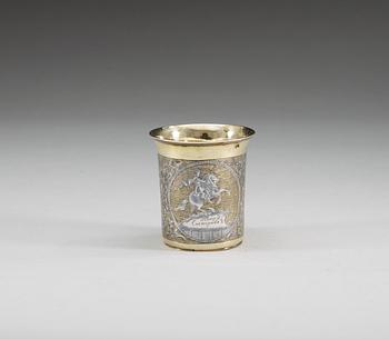 A RUSSIAN SILVER-GILT AND NIELLO BEAKER, Moscow 1843.