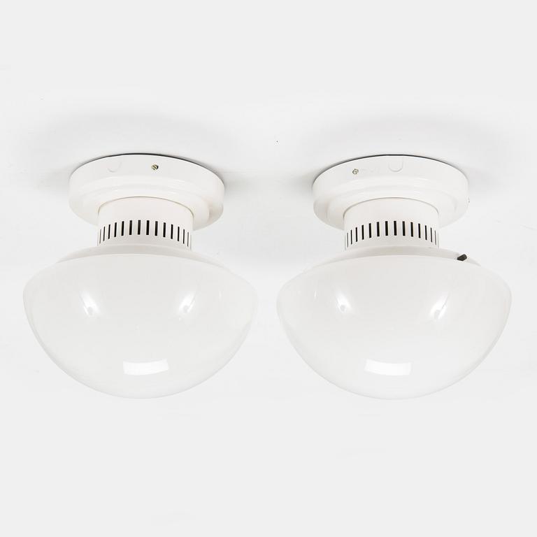 Klaus Michalik, A pair of 1990s wall / ceiling lights, 'Bau' model 5576/30 for Thorn Orno, Finland.