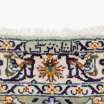A Keshan carpet, signed, c. 410 x 297 cm.