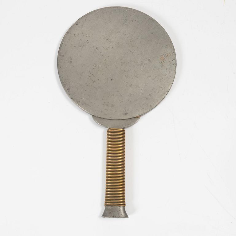 Estrid Ericson & Björn Trägårdh, a pewter and brass hand mirror model A 1444, Svenskt Tenn, Sweden 1930s-40s.