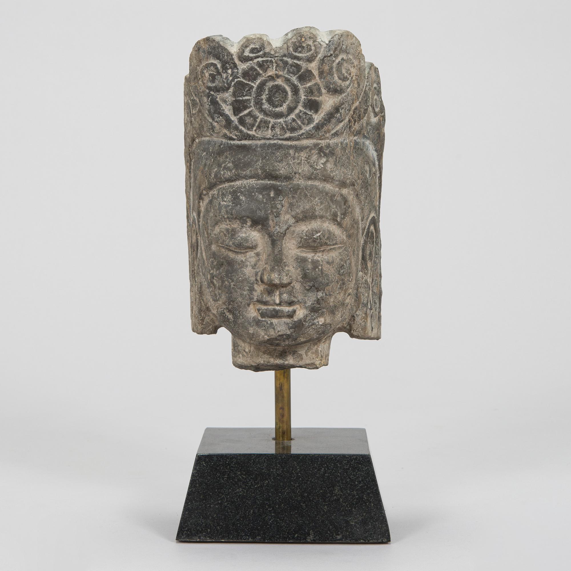 A well sculpted Ming style head of Guanyin, presumably 20th century.