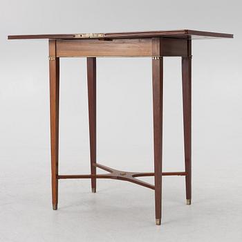 A late Gustavian style games table/sewing table, early 20th century.