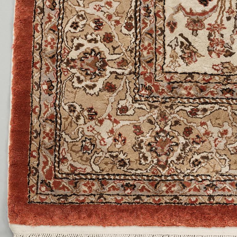 A chinese slik carpet, around 254 x 154 cm.