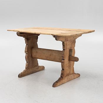 A pine trestle table, 19th century.