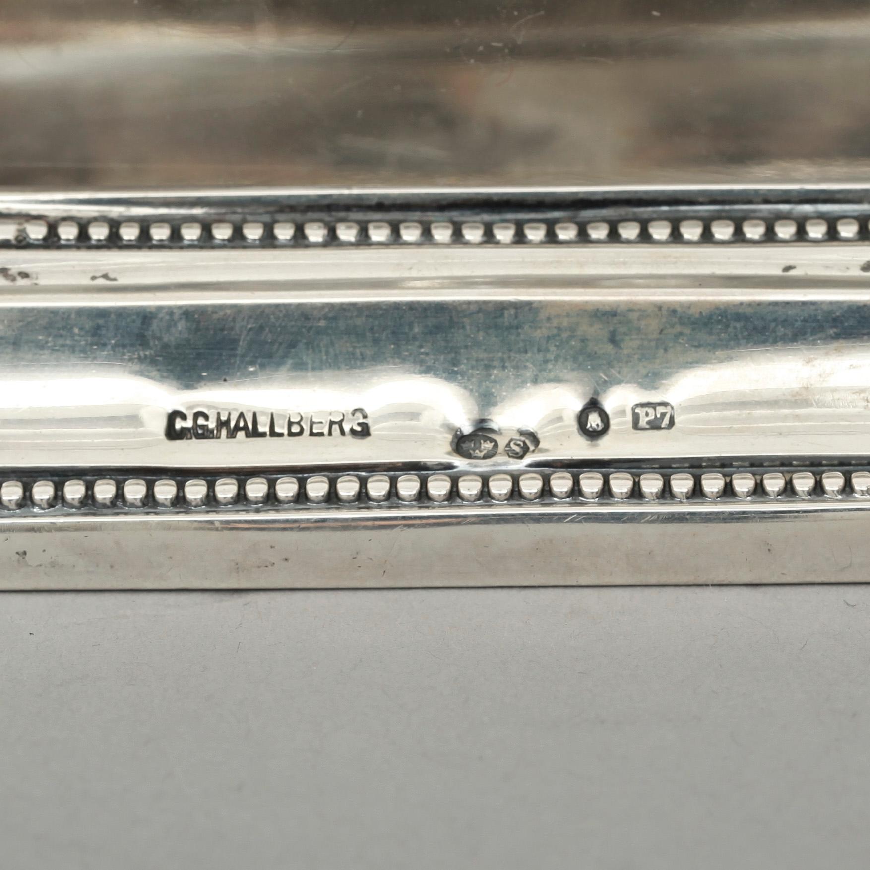 SKRIVSTÄLL, silver, CG Hallberg, Stockholm, 1917. Brickans vikt 210 g.