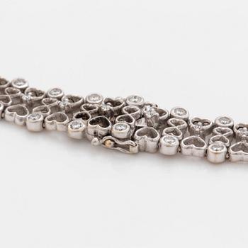 A brilliant cut diamond necklace. Total carat weight of diamonds circa 6.00 cts.