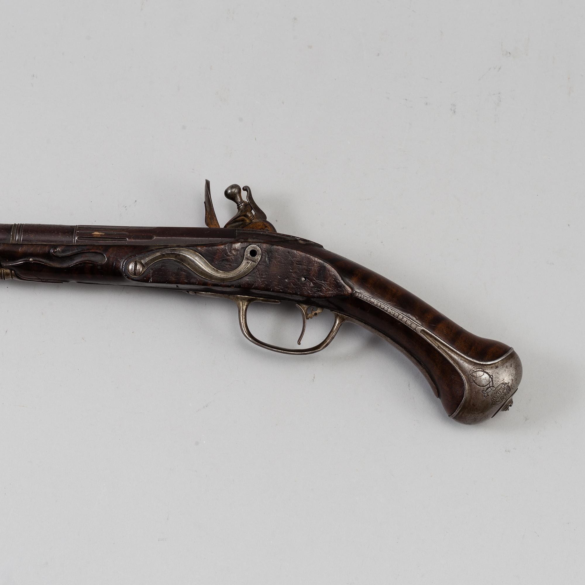 A Danish flint lock pistol signed, (Paul Nielsen Norrman, ca 1700).