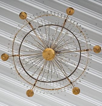 A late Gustavian gilt brass and cut glass seven-light chandelier, Stockholm, late 18th century.