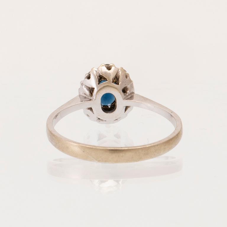 An 18K white gold carmosé ring set with an oval faceted sapphire and round brilliant-cut diamonds, Alessandria Italy.