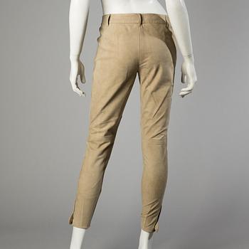 A beige suede pants by Ralph Lauren.
