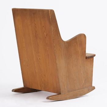 Axel Einar Hjorth, a stained pine "Lovö" rocking chair, Nordiska Kompaniet, Sweden, 1930s.