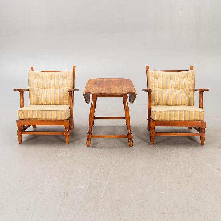 A set of two "Åre" armchairs and table by Gunnar Göpert 1940/50s.
