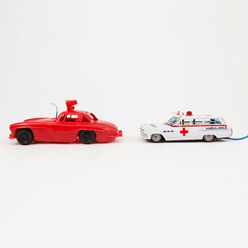 Two toy cars Germany and England 1960s.