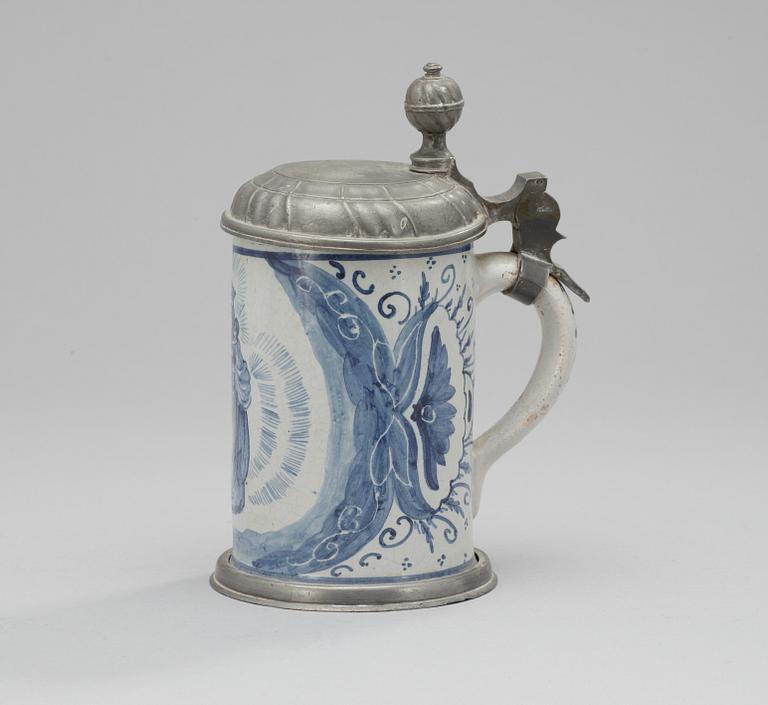 A faience and pewter jug. 18th century.