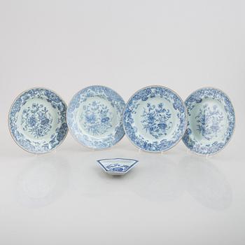 A group of four blue and white dishes and a cabaret piece, Qing dynasty, 18th century.