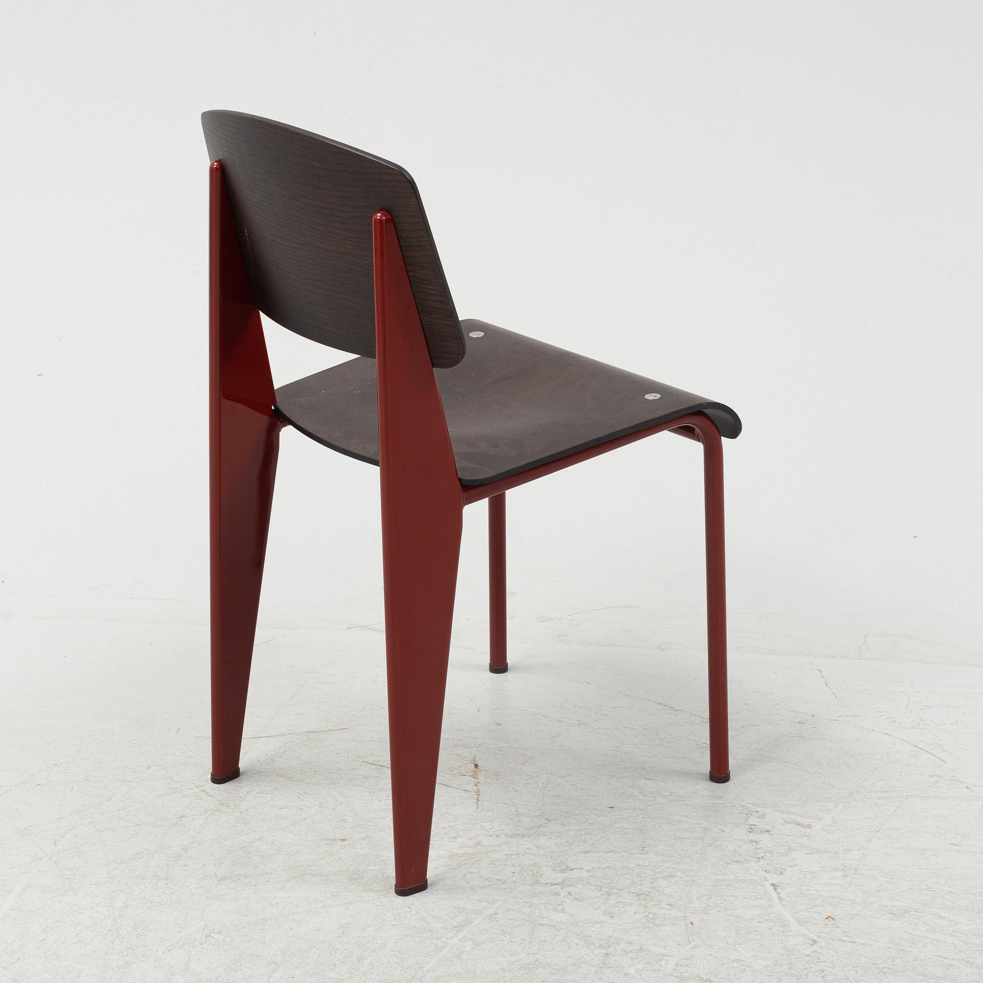 A Standard chair by Jean Prouvé for Vitra, dated 2002.