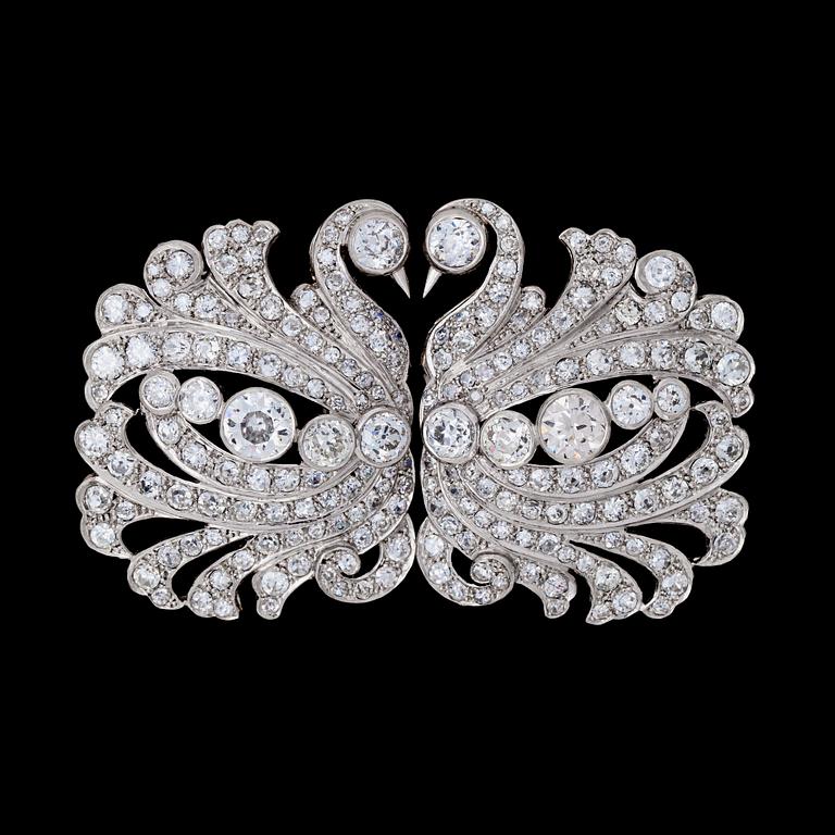 A diamond double clip brooch, tot. app. 20 cts. 1930-40's.
