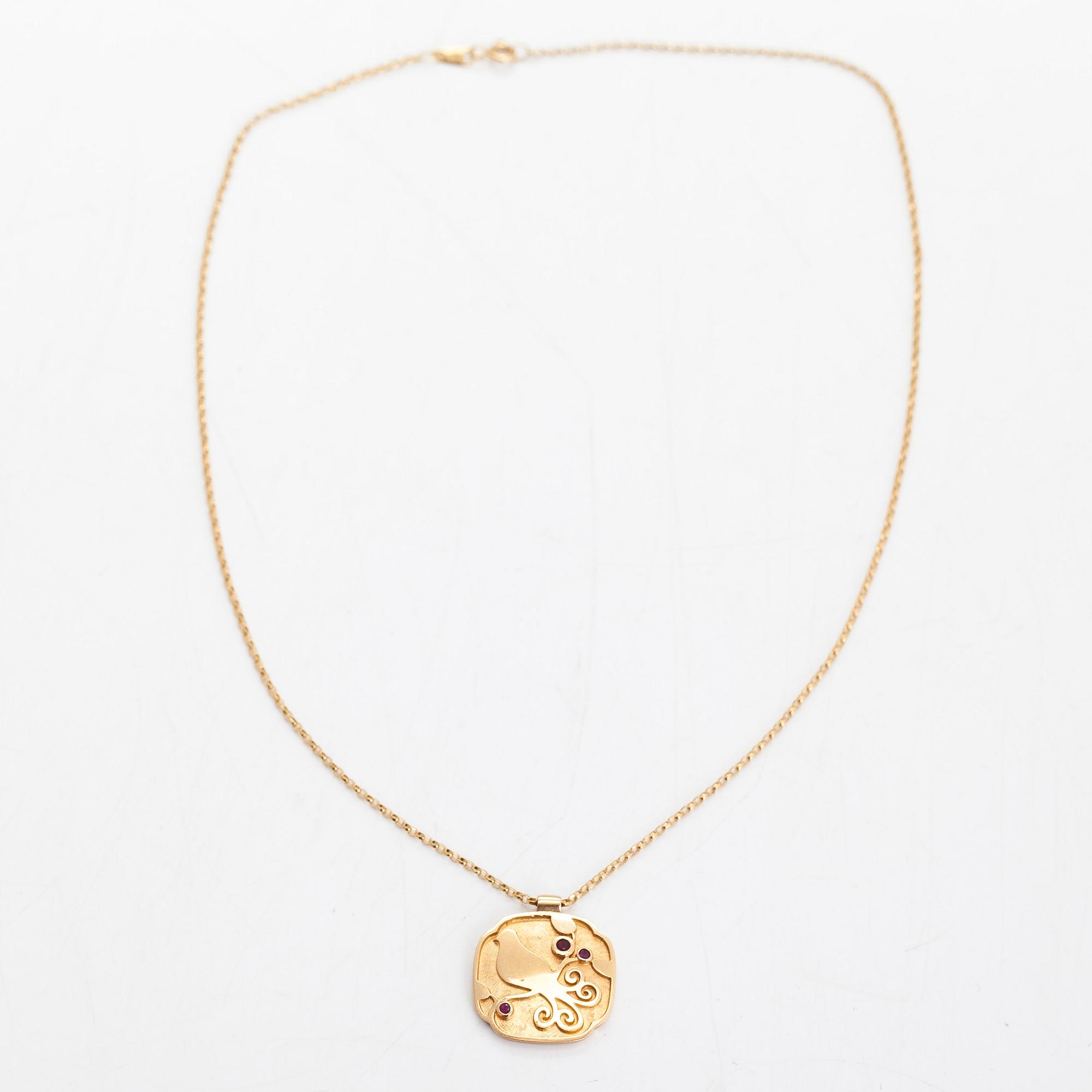 Halsband/hänge, 18K guld och rubiner.  Kedjan stämplad Unoaerre, Italien.