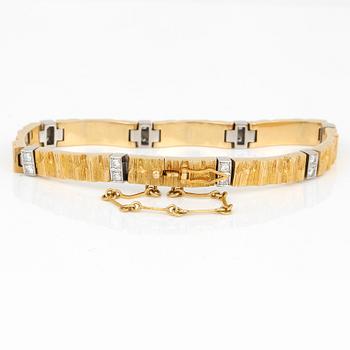 ARMBAND, 18K guld, 16 diamanter, Lapponia, 1984. Vikt ca 30g.