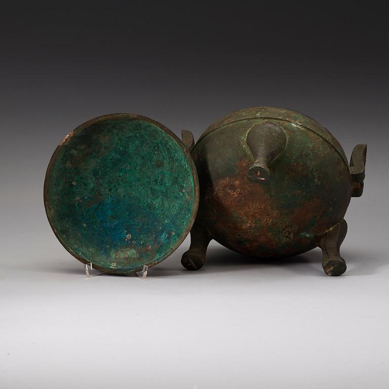 A bronze ding tripod censer with cover, presumably Han dynasty (206 BC - 220 AD).