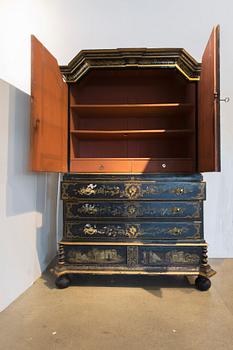 An early 18th century Chinese style cupboard.