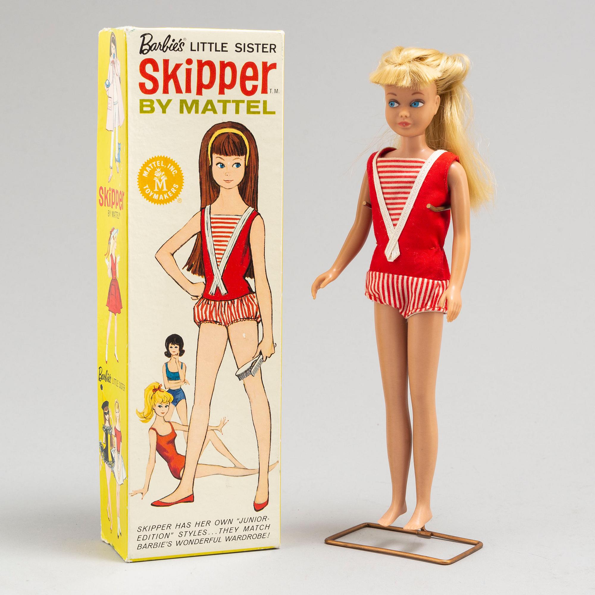 a set of 11 Barbiedolls and a collectors book ("Barbie her life & times" by Billyboy, 1987), Mattel 1960's-70's.
