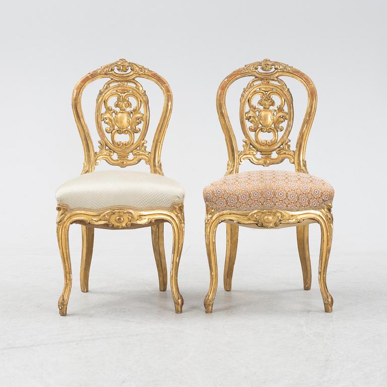 A pair of gesso and giltwood rococo-revival chairs, later part of the 19th Century.