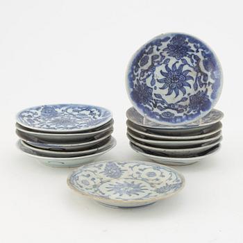 A set of 12 similar Chinese blue and white porcelain small dishes, late Qing dynasty, second half of the 19th Century.