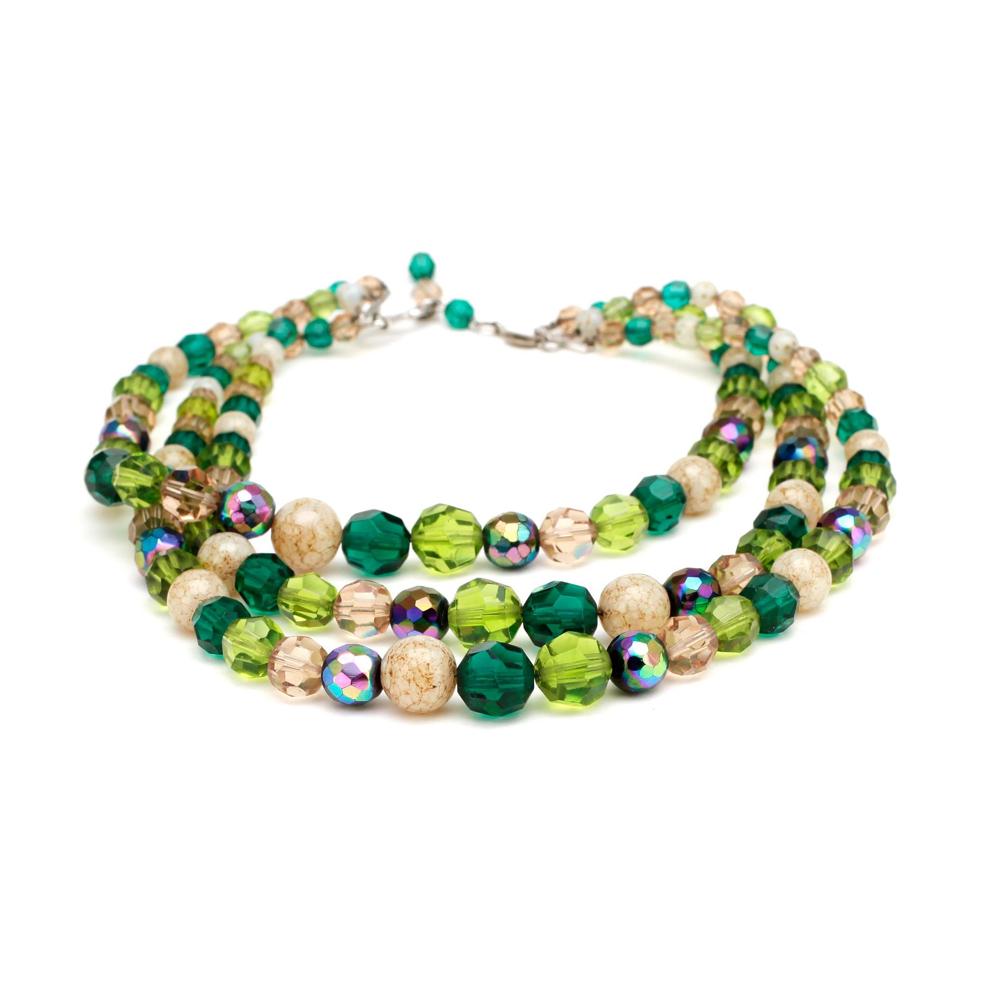 CHRISTIAN DIOR, a green three strand glass beaded necklace.