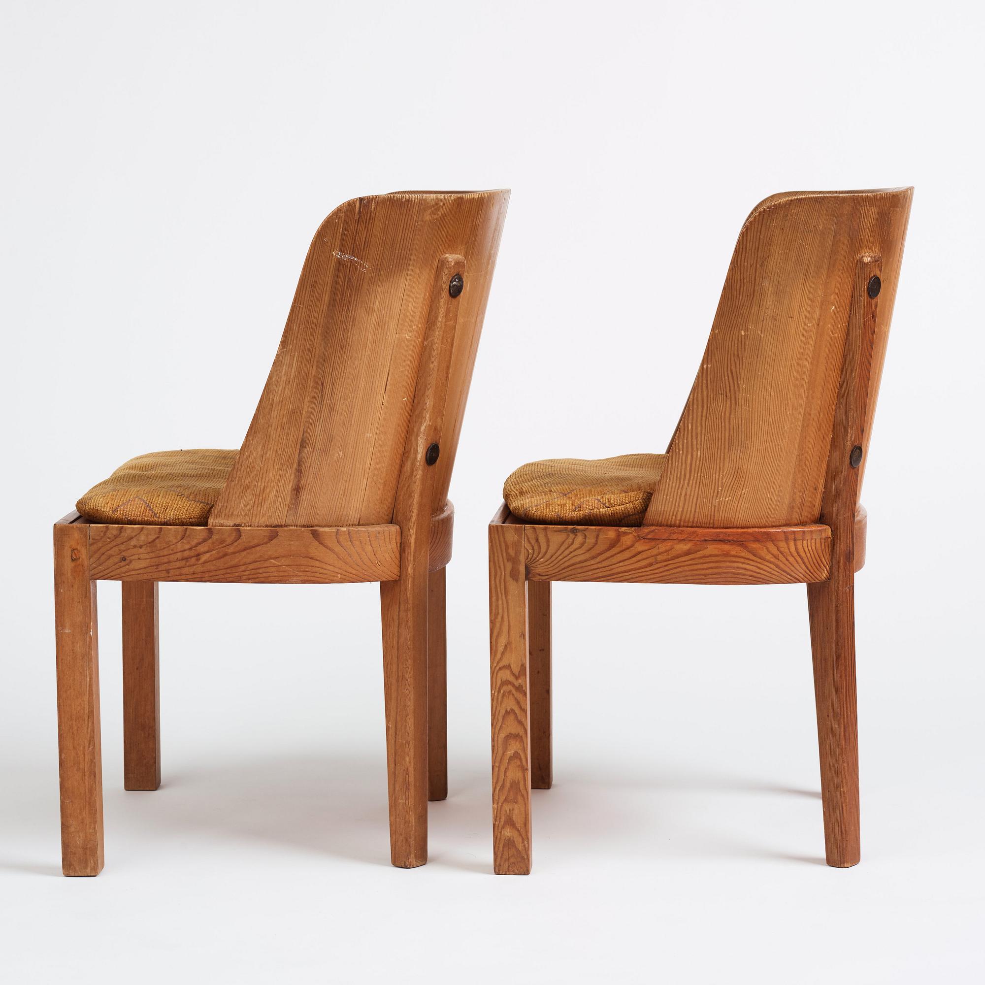 Axel Einar Hjorth, a pair of stained pine 'Lovö' chairs, Nordiska Kompaniet, Sweden 1930s.