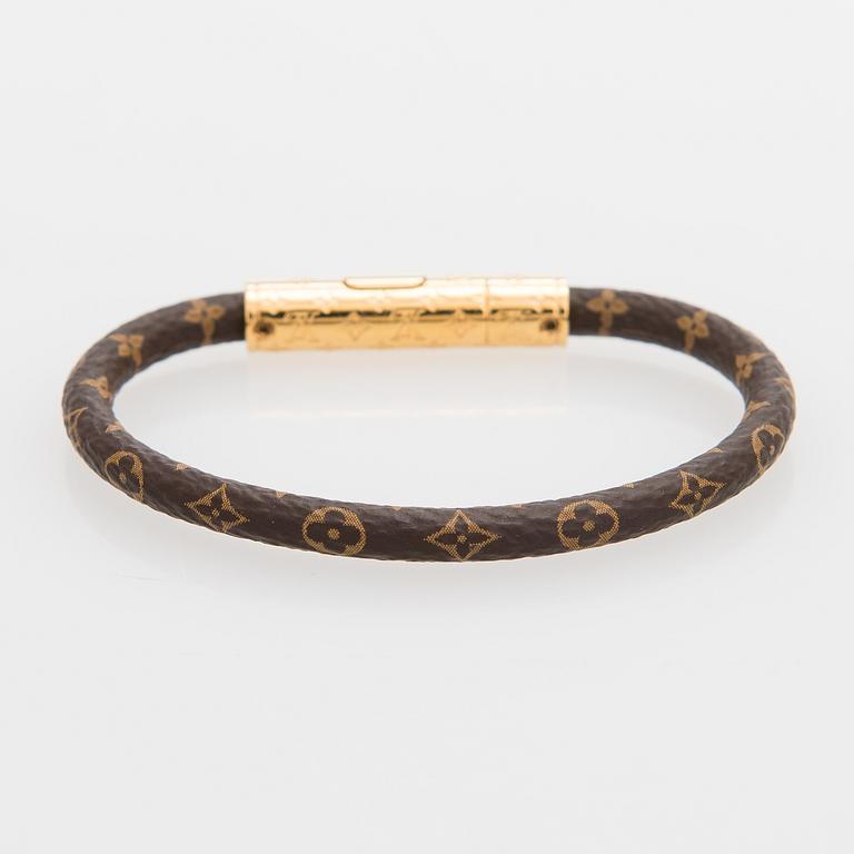 Louis Vuitton, "Confidential" rannekoru. Merkitty Made in Spain.